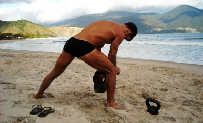 kettle bell workout on beach