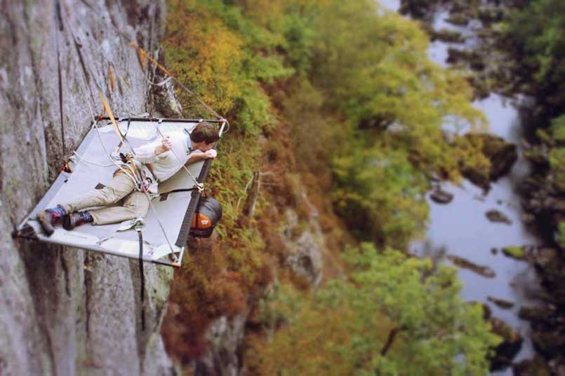 man cliff camping in snowdonia