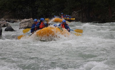 two groups of white water rafters