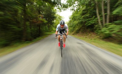 man cycling toward camera
