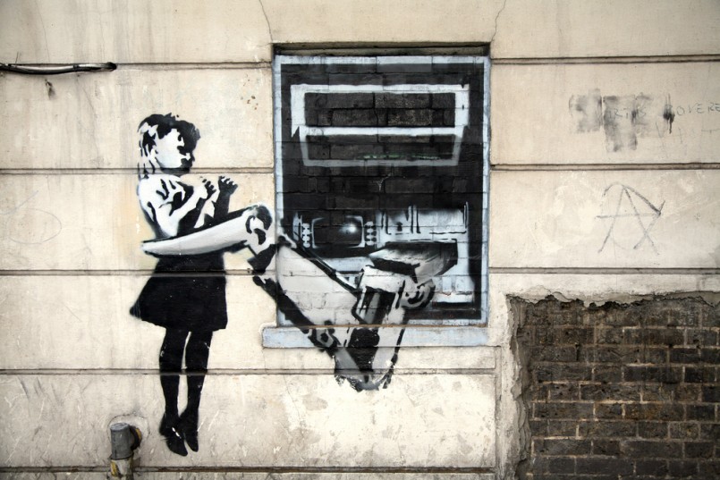 Banksy’s %22Cash Machine Girl%22 Graffiti in London.jpb