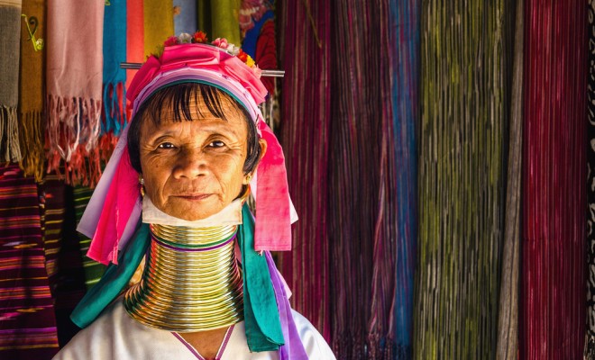 Women of the Kayan Lahwi tribe known for wearing neck rings, brass coils to extend the neck