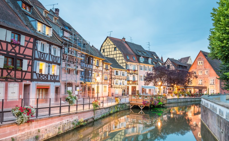 Colmar, Petit Venice, water canal and traditional colorful houses. Alsace, France. Long exposure.