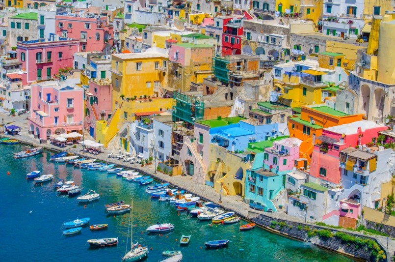 italian island procida is famous for its colorful marina, tiny narrow streets and many beaches which all together attract every year crowds of tourists coming from naples – napoli