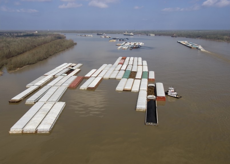 Aerial of barge tow approaching a bend in the Mississippi River