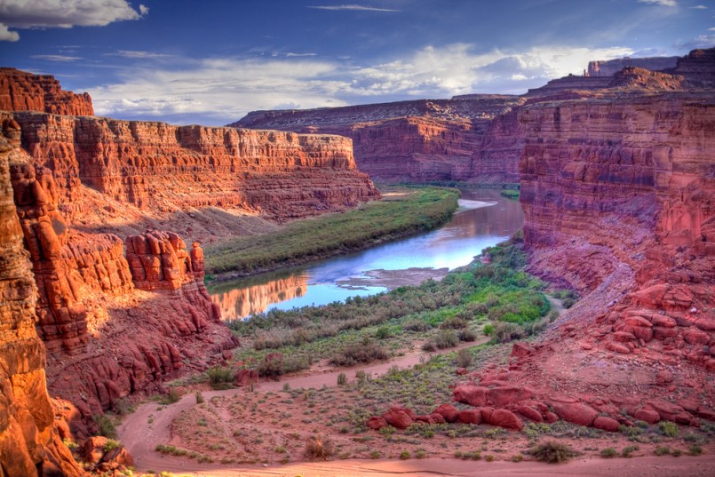 The Colorado River that runs through Canyonlands National Park is located near the city of Moab, Utah. Processed using HDR